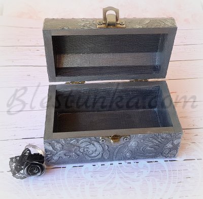 A small wooden jewellery box 