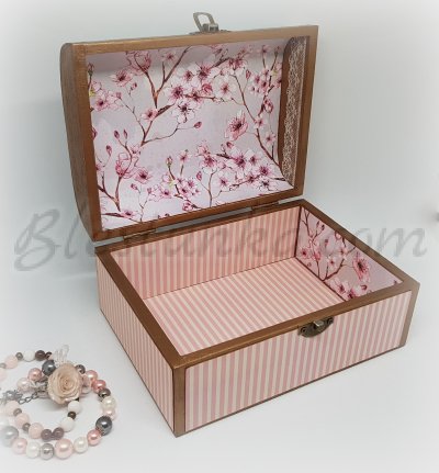 A wooden jewellery box 